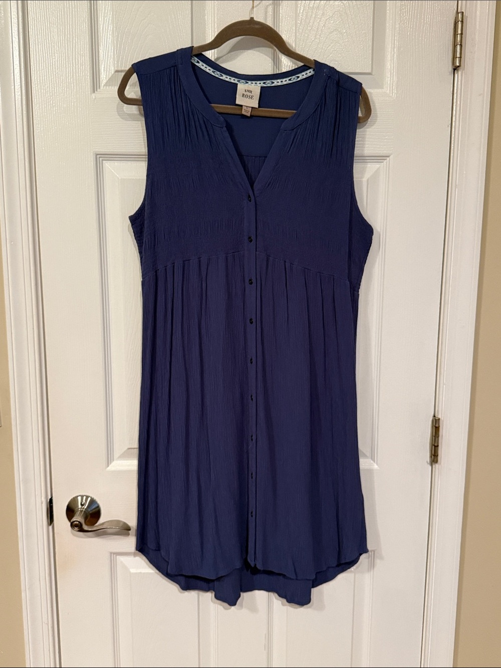 Periwinkle blue sleeveless button down dress